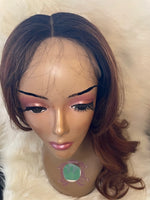 Amber synthetic blend wig